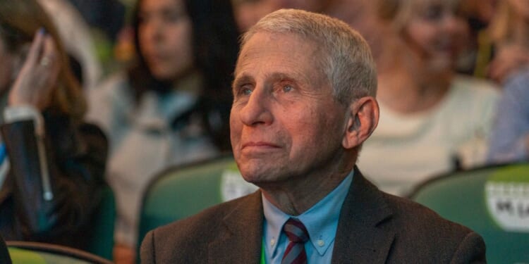 Anthony Fauci listens to guest speaker and Atlantic editor-in-chief Jeffrey Goldberg during the opening night of the New Orleans Book Festival at McAlister Auditorium on March 27, 2025, in New Orleans, Louisiana.