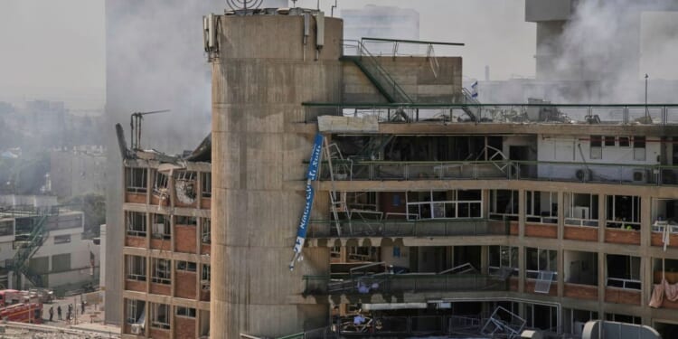 Smoke rises from the Soroka hospital complex in Beersheba, Israel, after a building was struck by an Iranian missile on Thursday.