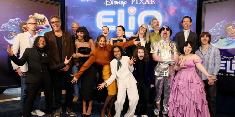 From left to right, Pete Docter, CCO, Pixar; Young Dylan; Brad Garrett; Jim Morris, President, Pixar; Jameela Jamil; Madeline Sharafian; Zoe Saldaña; Domee Shi; Yonas Kibreab; Mary Alice Drumm; Remy Edgerly; Rob Simonsen; Brendan Hunt; Brandon Moon; Naomi Watanabe; and Jake Getman attend the World Premiere of Disney and Pixar's "Elio"in Los Angeles, California, on June 10.