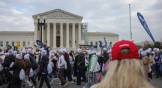 March for Life participants demonstrate in front of the Supreme Court in Washington, DC