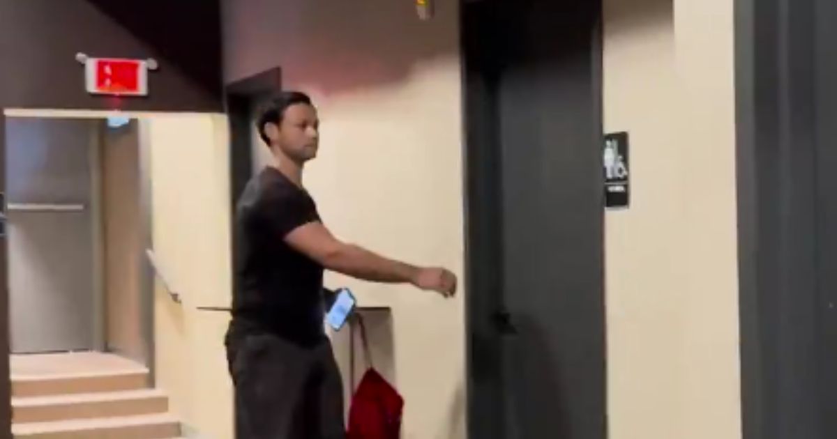 After being confronted about admitting that the Johnson and Johnson COVID vaccine was not ready for use, Associate Manager of Regulatory Affairs at Johnson & Johnson Joshua Rys fled toward a women's restroom.