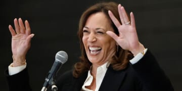 Former Vice President Kamala Harris waves her hands at the audience of the State of the People POWER Tour opening ceremony on June 6, 2025.