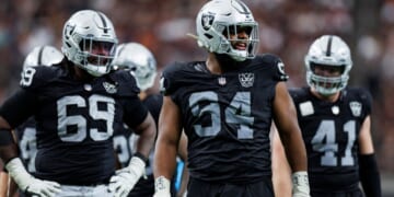 Defensive tackle Christian Wilkins, center, of the Las Vegas Raiders stands on the field during the fourth quarter of an NFL football game against the Cleveland Browns in Las Vegas, Nevada, on Sept. 29, 2024.