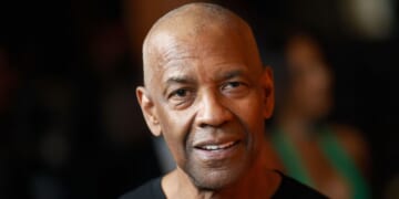 Actor Denzel Washington smiles at a special screening of "Highest 2 Lowest" in Los Angeles on Aug. 13, 2025.
