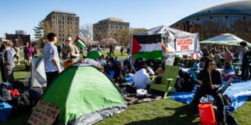 Pro-Palestinian protesters rally at an encampment made at MIT in Cambridge, Massachusetts, on April 22, 2024.