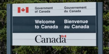 A sign welcoming people to Canada is pictured on the Canadian border on July 1, 2018.
