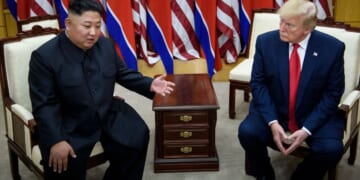 North Korea's leader Kim Jong-un, left, and President Donald Trump, right, meet in Panmunjom, Korea, on June 30, 2019.