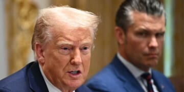 President Donald Trump, left, speaks while Defense Secretary Pete Hegseth, right, looks on during a cabinet meeting in the Cabinet Room of the White House in Washington, D.C., on Tuesday.