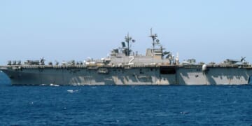 The amphibious assault ship USS Essex returns to sea Feb. 17, 2006, shortly after arriving in Subic Bay, Philippines.