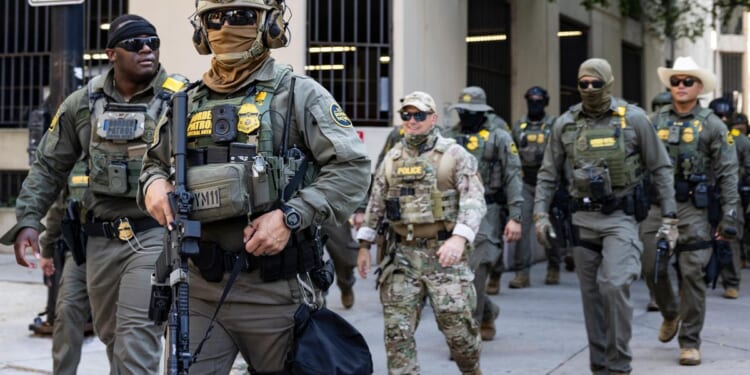 J.B. Pritzker says troops could be deployed to Chicago as immigration agents patrol downtown