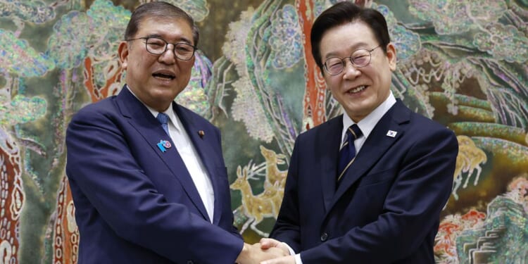 Leaders from Japan and South Korea commit to closer ties in their final summit
