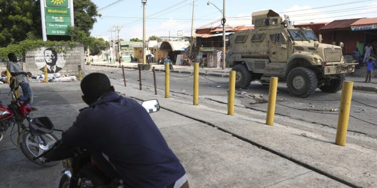 U.N. authorizes a much larger force to fight gangs in Haiti with new power to detain gang members