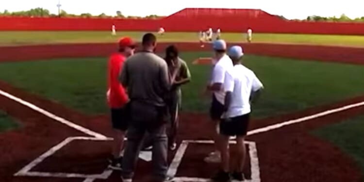 A 27-year-old coach was taken by helicopter to a hospital, where he was listed in stable condition, according to the news report,