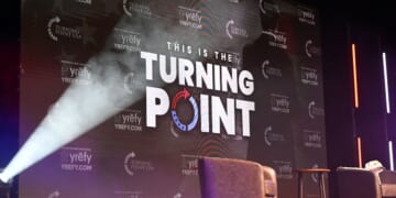 The Turning Point USA logo is displayed on stage at Burruss Hall at Virginia Tech University in Blacksburg, Virginia, on Sept. 24, 2025.