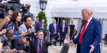 President Donald Trump talks to the media before boarding Marine One on the South Lawn of the White House on Sept. 21, 2025, in Washington, D.C.