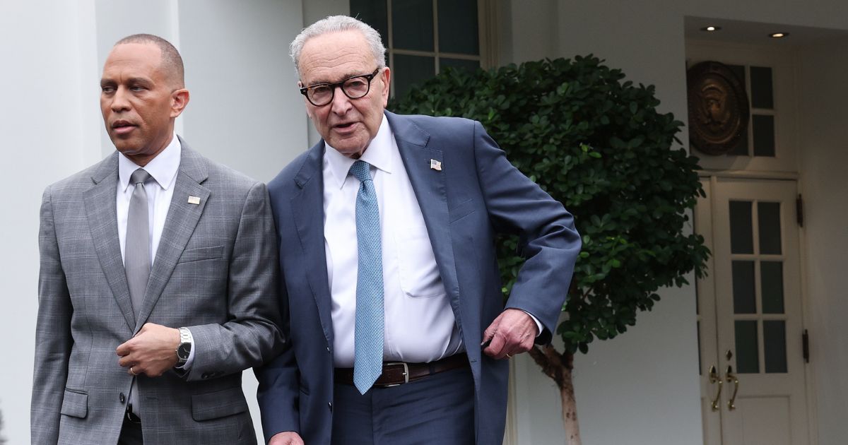 House Minority Leader Hakeem Jeffries and Senate Minority Leader Charles Schumer leave the White House following a meeting with President Donald Trump on Sept. 29, 2025, in Washington, D.C.