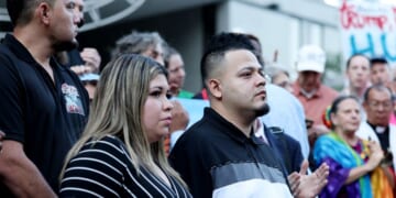 Kilmar Abrego Garcia and his wife Jennifer Vasquez Sura attend a prayer vigil before he enters a U.S. Immigration and Customs Enforcement field office on Aug. 25, 2025, in Baltimore, Maryland.
