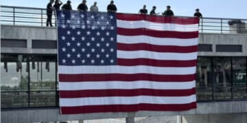 Massive American Flag Tribute Unfurled at Charlie Kirk Assassination Site