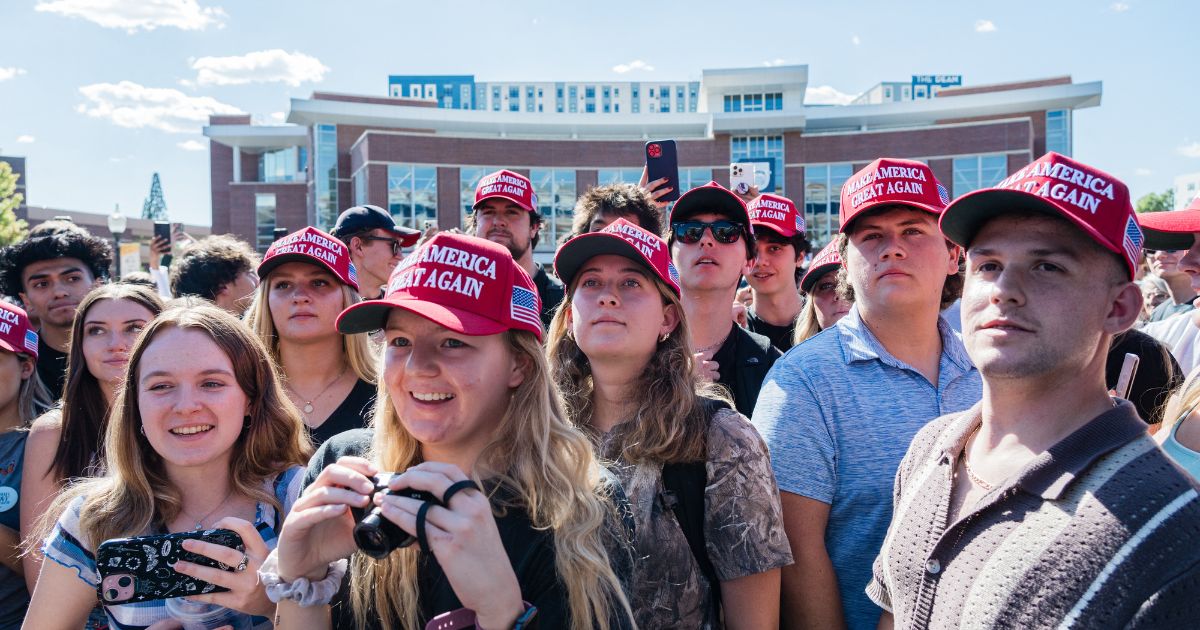 Attendees listen to Charlie Kirk speak at University of Nevada in Reno during his "You're Being Brainwashed" tour on Oct. 8, 2024.