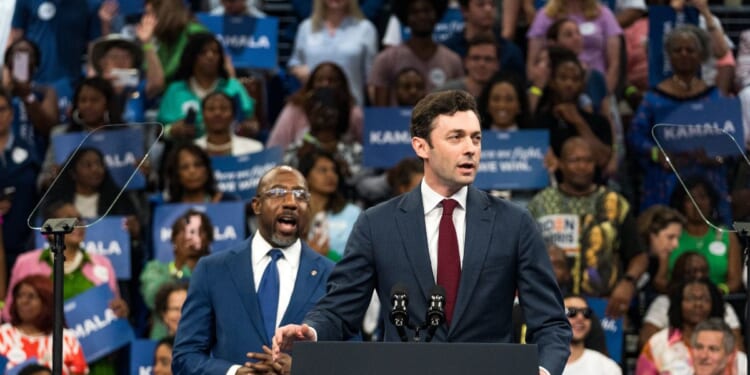 Sen. John Ossoff, a Democrat from Georgia, speaks at a campaign rally for Vice President Kamala Harris at the Georgia State Convocation Center on July 30, 2024, in Atlanta, Georgia.