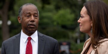 Ben Carson speaks with reporters as Agriculture Secretary Brooke Rollins listens outside the White House in Washington, D.C., on Wednesday.