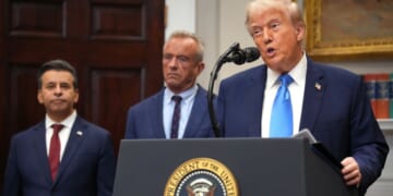 President Donald Trump, right, accompanied by Health and Human Services Secretary Robert F. Kennedy Jr., center, and Food and Drug Administration Commissioner Dr. Marty Makary, left, delivers an announcement on “significant medical and scientific findings for America’s children” in the Roosevelt Room of the White House in Washington, D.C., on Monday.