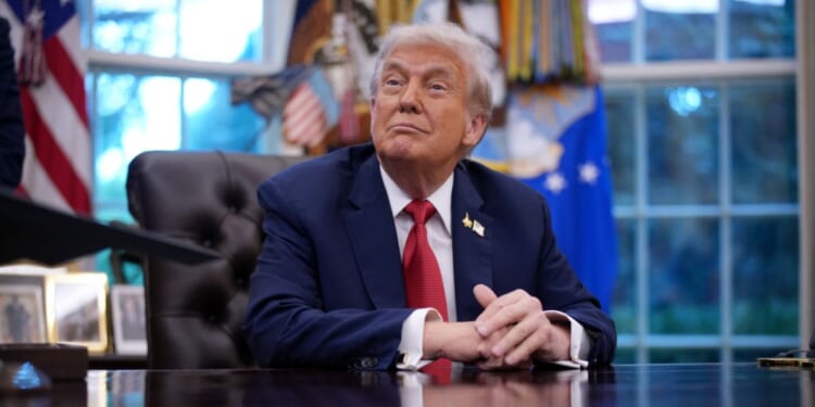 President Donald Trump looks on before signing executive ordres in the Oval Office of the White House on Sept. 25, 2025, in Washington, D.C.