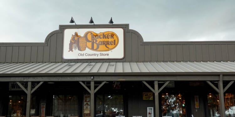 A Cracker Barrel sign featuring the old logo hangs outside of a restaurant on Aug. 27, 2025, in Florida City, Florida.