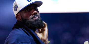 Los Angeles Lakers' Lebron James stands on the court before an NBA basketball preseason game against the Golden State Warriors in San Francisco, California, on Sunday.