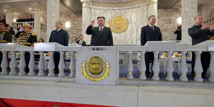 North Korea celebrating Kim Jong-un with military parade featuring new long-range missile