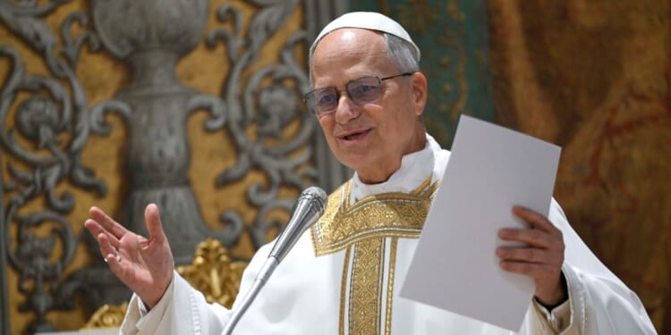 Robert Francis Prevost presides over his first Mass as Pope Leo XIV with cardinals in the Sistine Chapel at the conclusion of the Conclave on May 9, 2025, in Vatican City, Vatican.