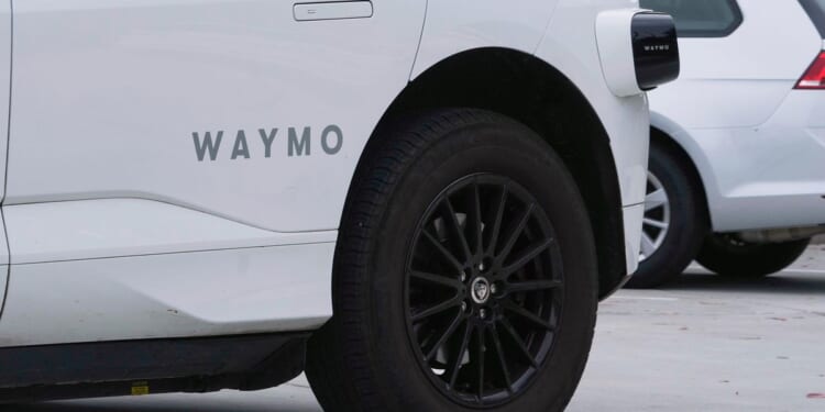 Federal highway safety officials probing Waymo after robotaxi goes around stopped school bus