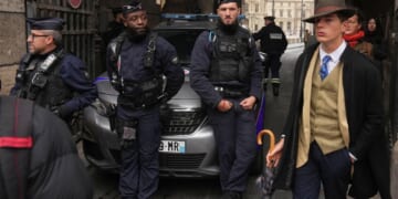 Inspector Clouseau? The mystery man in an AP photo after the Louvre jewel heist creating a buzz