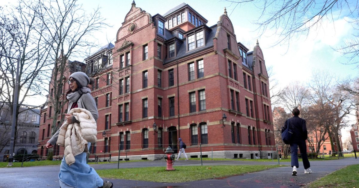 Students walk on the campus of Harvard University in Cambridge, Massachusetts, on Dec. 17, 2024.