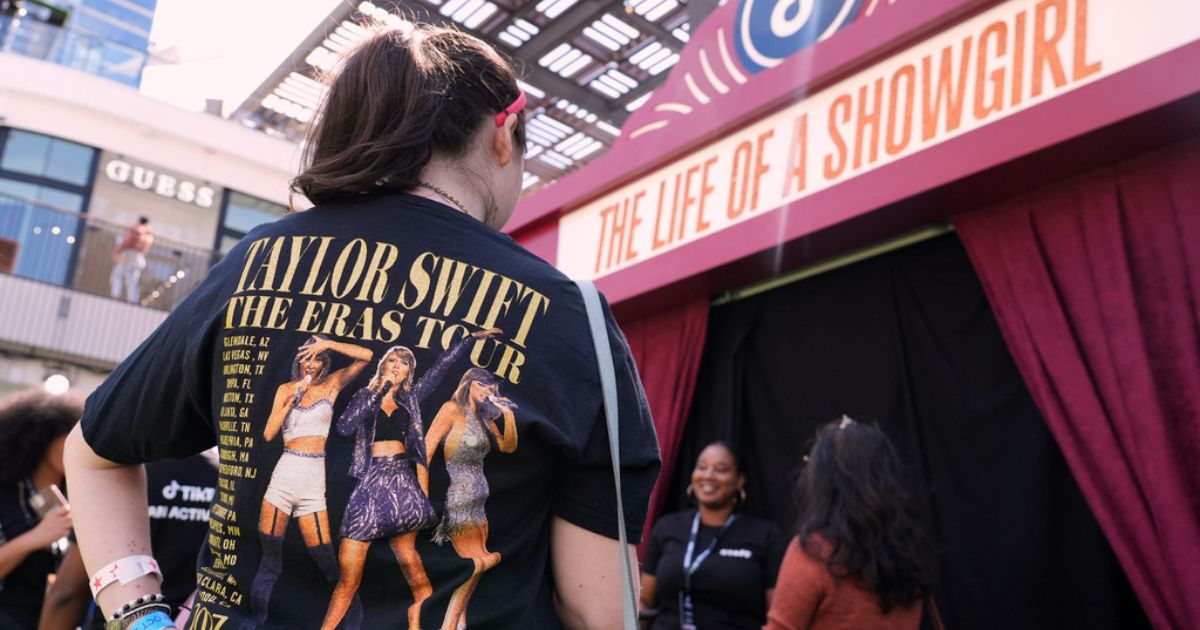 Taylor Swift fans await entry to a TikTok/Taylor Swift fan activation pop-up event Friday to celebrate the release of her latest album "The Life of a Showgirl," in Los Angeles.