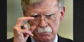 Then-national security adviser John Bolton answers journalists questions after a meeting with Belarus President in Minsk on Aug. 29, 2019.