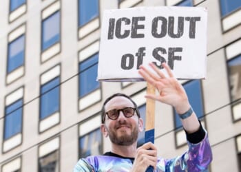 California State Sen. Scott Weiner waves to onlookers during the Pride Parade on June 29, 2025, in San Francisco, California.