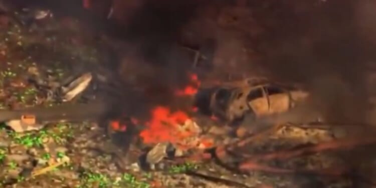 Debris burns where a blast levelled an explosives factory in Tennessee Friday morning.