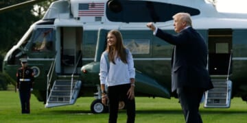 President Donald Trump and his granddaughter, Kai Trump, walk to Marine One on the South Lawn of the White House as they prepare to depart on Sept. 26, 2025, in Washington, D.C.