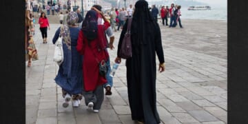 Women wearing veils and burquas walk in Venice, Italy, in a file photo from June 1, 2011.