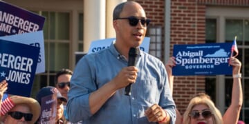 Jay Jones, who is running to become Virginia's attorney general, speaks to the audience during Abigail Spanberger's bus tour stop in Fairfax, Virginia, on June 26.