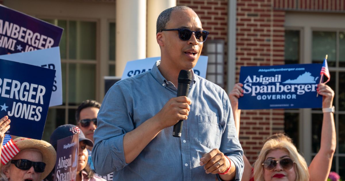 Jay Jones, who is running to become Virginia's attorney general, speaks to the audience during Abigail Spanberger's bus tour stop in Fairfax, Virginia, on June 26.