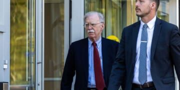 Former U.S. National Security Advisor John Bolton leaves federal court after pleading not guilty to charges of mishandling classified material on Oct. 17, 2025, in Greenbelt, Maryland.