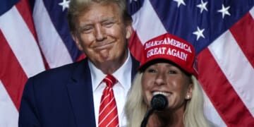 Rep Marjorie Taylor Greene, right, speaks alongside then-presidential candidate Donald Trump, left, at a campaign event in Rome, Georgia, on March 9, 2024.