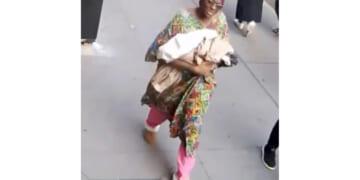 This photo taken from surveillance video footage provided by the New York Police Department, shows a woman who is wanted for questioning after an infant girl was abandoned at a New York City subway station Monday.