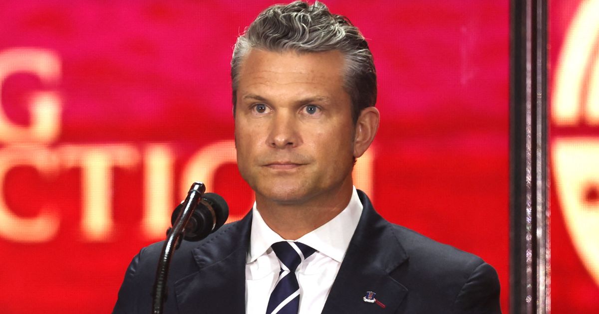 Secretary of War Pete Hegseth delivers remarks at the public memorial service for Charlie Kirk in Glendale, Arizona, on Sept. 21.