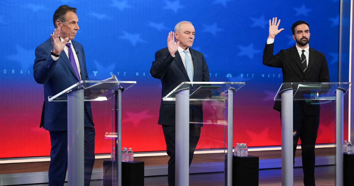 New York City mayoral candidates, Independent and former New York Gov. Andrew Cuomo, left, Republican Curtis Sliwa, center, and Democrat Zohran Mamdani debate in New York Thursday.