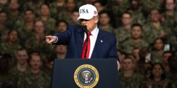 President Donald Trump delivers a speech to U.S. Navy personnel on board the USS George Washington aircraft carrier at the US naval base in Yokosuka, Japan, on Tuesday.