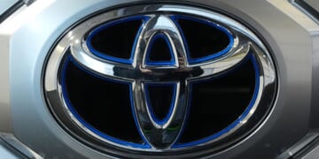 A Toyota logo is seen on a Toyota Tundra HV 4x4 at the Pittsburgh International Auto Show in Pittsburgh, Pennsylvania, on Feb.15, 2024.