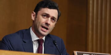 Georgia Democrat Senator Jon Ossoff sits in a committee room in the United States Capitol